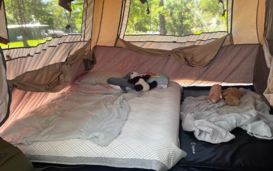 budget glamping tent setup with queen mattress cooling cover and proper bedding thunderbird park camping