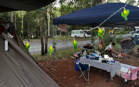 coleman tent interior setup with fairy lights and bedding at thunderbird park