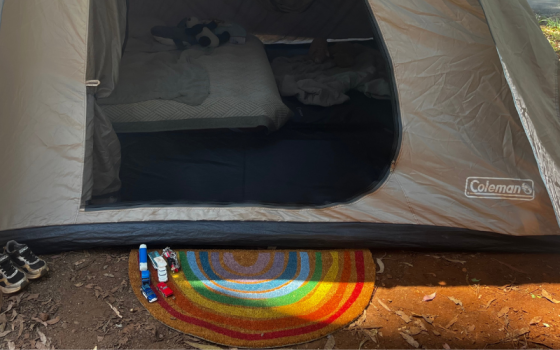 rainbow doormat at tent entrance thunderbird park camping hack for keeping tent clean