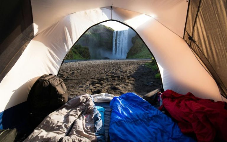 sleeping bag laid out in tent